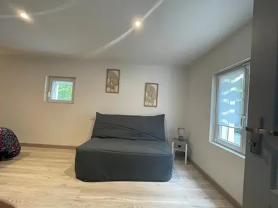 Coin salon dans l'établissement Maison du circuit - Hunaudières