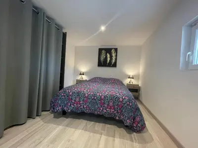 Un ou plusieurs lits dans un hébergement de l'établissement Maison du circuit - Hunaudières