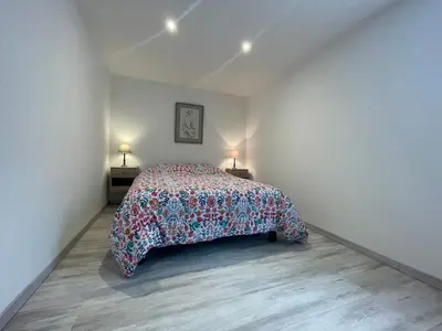 Un ou plusieurs lits dans un hébergement de l'établissement Maison du circuit - Hunaudières