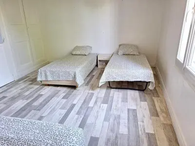 Un ou plusieurs lits dans un hébergement de l'établissement La Maison Douessine - Hyper Centre Doué La Fontaine - WIFI gratuit -Proche Bioparc Zoo