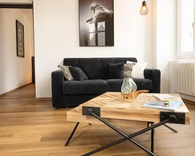 Coin salon dans l'établissement Immeuble H4 - cozy & comfortable stay