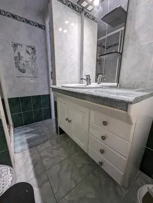 Salle de bains dans l'établissement Le Bleuet
