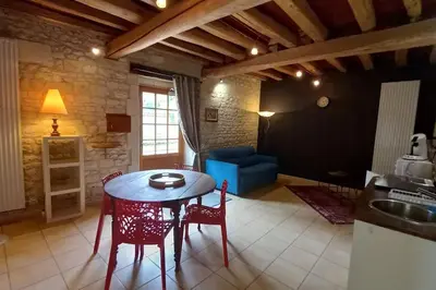 Coin salon dans l'établissement Le Logis de la Tour