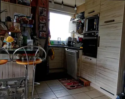 Cuisine ou kitchenette dans l'établissement Résidence Pointe de la Verdure