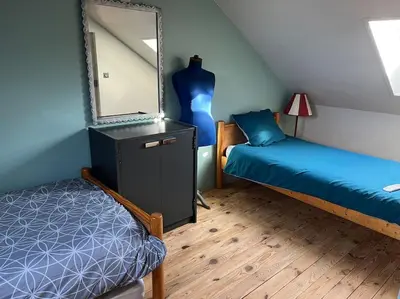 Un ou plusieurs lits dans un hébergement de l'établissement Le chalet