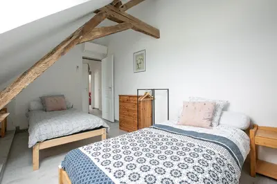 Un ou plusieurs lits dans un hébergement de l'établissement Maison de Marcelline - Pour 10p maison climatisée