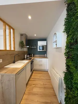 Cuisine ou kitchenette dans l'établissement La Loge Saumuroise - Charme, Confort & Central