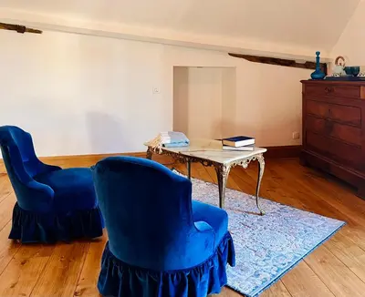 Coin salon dans l'établissement Maison Adrienne