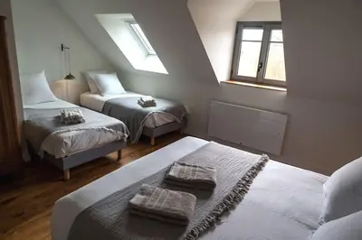 Un ou plusieurs lits dans un hébergement de l'établissement Les Biches, Maison Familiale jusqu'à 10 personnes