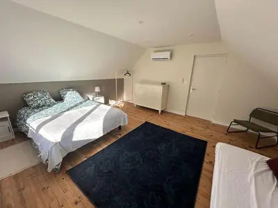 Un ou plusieurs lits dans un hébergement de l'établissement Appartement spacieux en centre ville