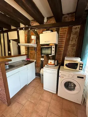 Cuisine ou kitchenette dans l'établissement Gîtes Place Plumereau de Tours
