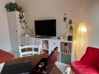 Télévision ou salle de divertissement dans l'établissement Le Bulloire