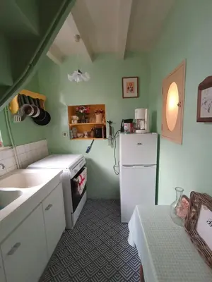 Cuisine ou kitchenette dans l'établissement Petite Chérie