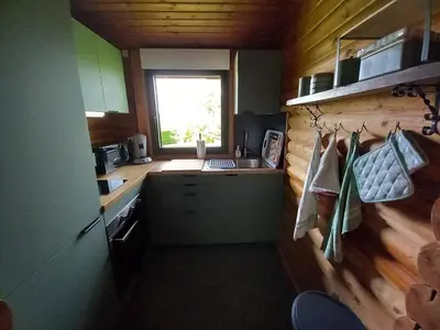 Cuisine ou kitchenette dans l'établissement Chalet des Echappées Belles