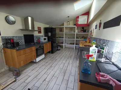 Cuisine ou kitchenette dans l'établissement L'atelier mazé milon
