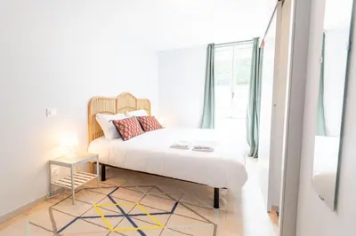 Un ou plusieurs lits dans un hébergement de l'établissement « AU VINCI VERT » Appartement 4 pers. NEUF