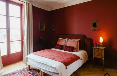 Un ou plusieurs lits dans un hébergement de l'établissement Chambres d'hôte - Maison des écrivains - 50 m de la cathédrale et place des jacobins