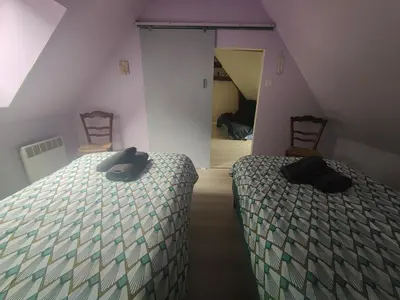 Un ou plusieurs lits dans un hébergement de l'établissement Le trainefeuilles,confortable,chaleureux,200m du zoo