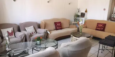 Coin salon dans l'établissement Welcome to Tuffe