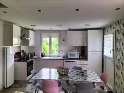 Cuisine ou kitchenette dans l'établissement Maison reposante
