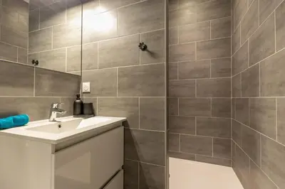 Salle de bains dans l'établissement Confort Modernité Centre Ville Parking Gratuit