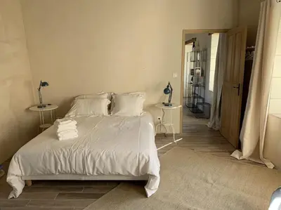 Un ou plusieurs lits dans un hébergement de l'établissement Charmante maison en Touraine, entre champs et châteaux