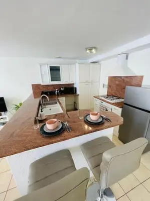 Cuisine ou kitchenette dans l'établissement Le Duplex - Hyper Centre-Ville - 6 voyageurs