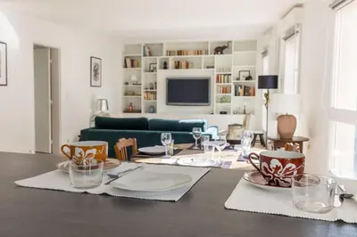 Télévision ou salle de divertissement dans l'établissement Appartement Hyper Centre Parking Privée