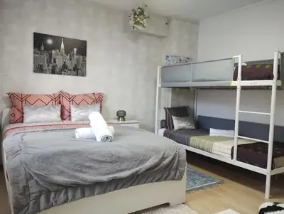 Un ou plusieurs lits dans un hébergement de l'établissement Appartement charmant à Noyers-sur-Cher - 45 m² - Parking