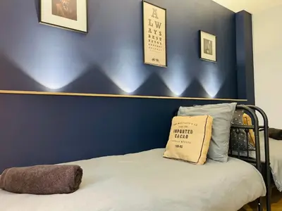 Un ou plusieurs lits dans un hébergement de l'établissement Appartement de standing hyper centre