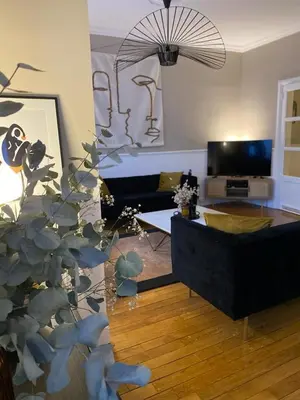 Télévision ou salle de divertissement dans l'établissement Appartement de standing hyper centre