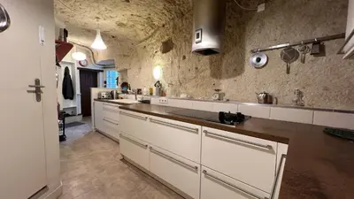 Cuisine ou kitchenette dans l'établissement Gîte Hurlevent