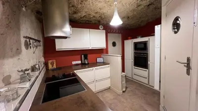 Cuisine ou kitchenette dans l'établissement Gîte Hurlevent