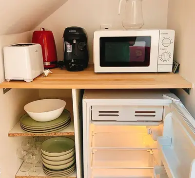 Cuisine ou kitchenette dans l'établissement Clos Pacello Appart