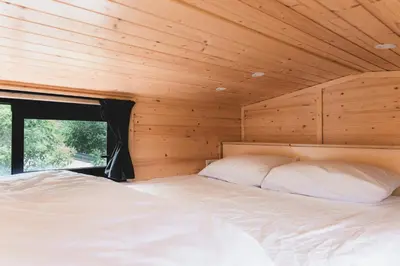 Un ou plusieurs lits dans un hébergement de l'établissement Paradise Home by Tiny Away