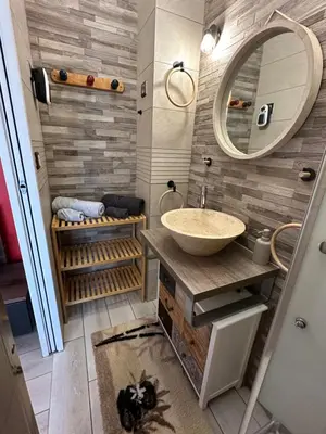 Salle de bains dans l'établissement L'Escale Arc-en-Ciel
