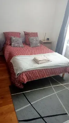 Un ou plusieurs lits dans un hébergement de l'établissement Chambre individuelle chez l'habitant pour une personne