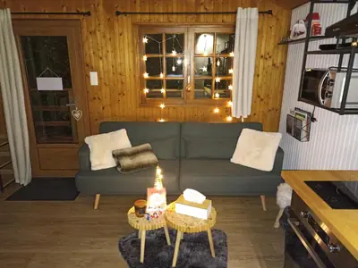 Coin salon dans l'établissement Le chalet à la campagne !