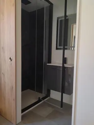 Salle de bains dans l'établissement Au coin des Lilas - studio 2
