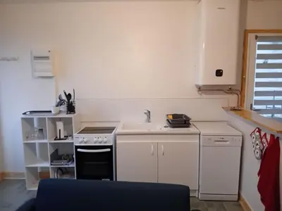 Cuisine ou kitchenette dans l'établissement Maisons du château