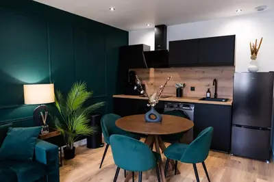 Cuisine ou kitchenette dans l'établissement L'Élégant, appartement au cœur de la ville