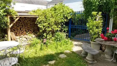 Jardin de l'établissement Logement tranquille et frais proche gare au RDC