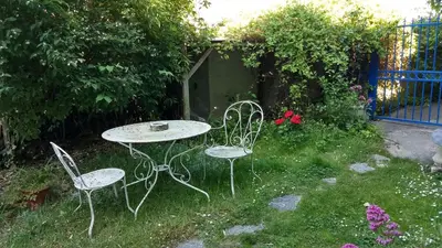 Jardin de l'établissement Logement spacieux et original proche gare au RDC