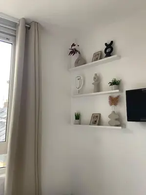 Télévision ou salle de divertissement dans l'établissement Le Bohème studio central