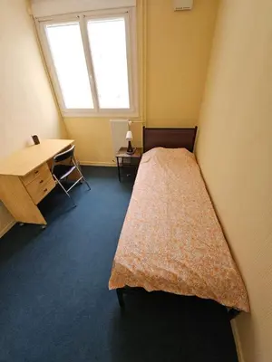 Un ou plusieurs lits dans un hébergement de l'établissement Appartement T4 à 40min à pieds de la gare de Saint-Pierre des corps