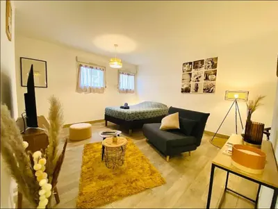 Coin salon dans l'établissement Appartement Centre-Ville - 3 Voyageurs