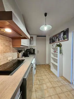 Cuisine ou kitchenette dans l'établissement Regard sur le château