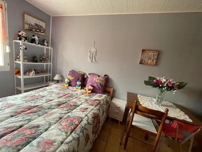 Un ou plusieurs lits dans un hébergement de l'établissement Chambre d'hôtes Lamidome