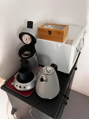 Cuisine ou kitchenette dans l'établissement Chambre indépendante RDC avec SdB, WC et parking