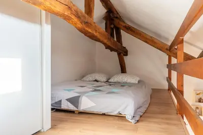 Un ou plusieurs lits dans un hébergement de l'établissement Le cocon - Appartement en hyper centre